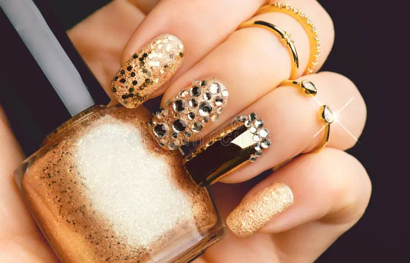 golden-nail-art-manicure-gems-sparkles-holiday-style-bright-bottle-polish-fashion-rings-83765990